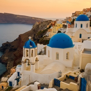 Houses built into Santorini cliffs